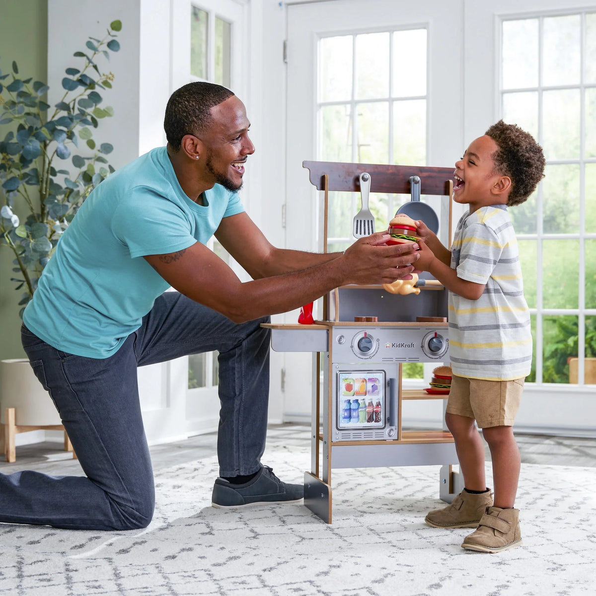 KidKraft Spin & Reveal Wooden Grill & Play Kitchen with Water-Reveal Food & 21 Accessories